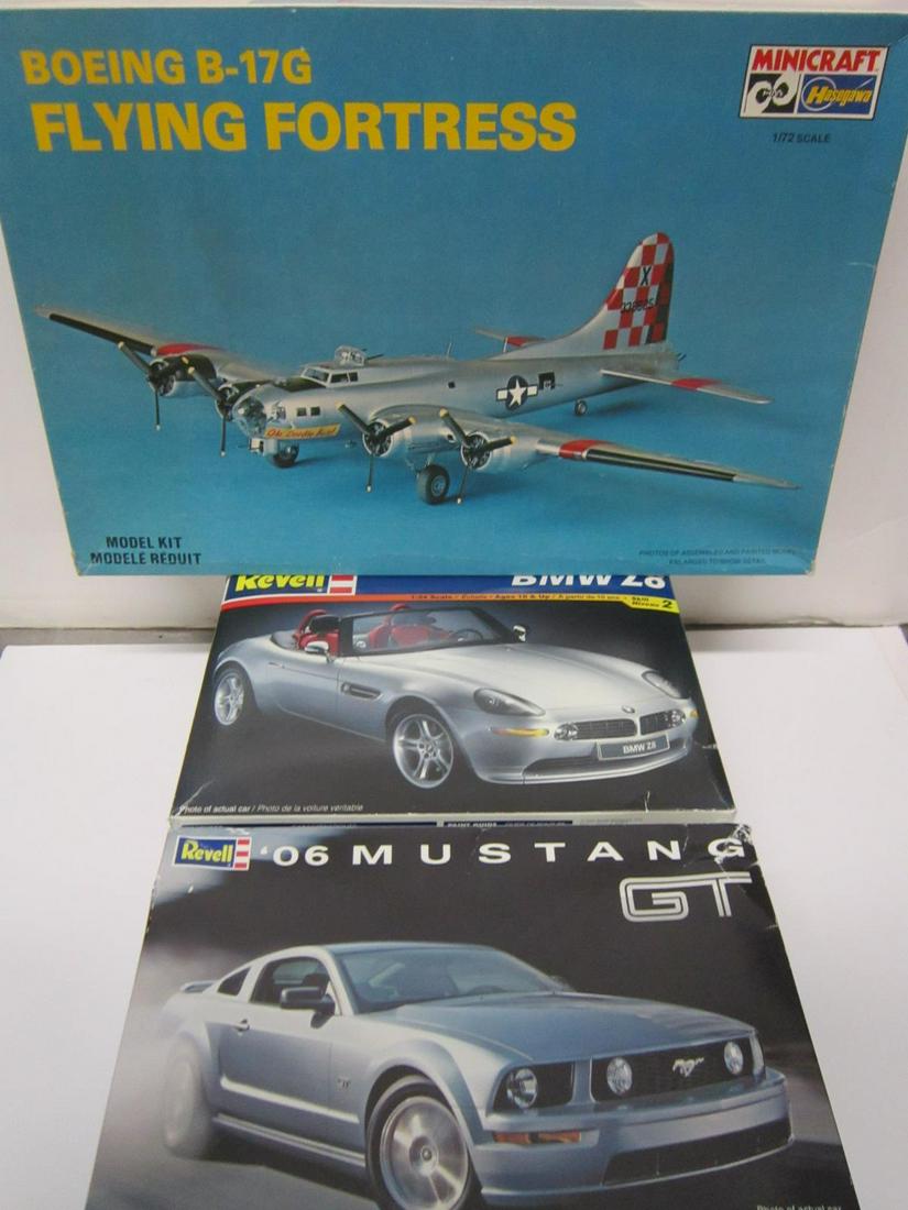 Model Airplane & Two Model Cars: Model Airplane & Two Model Cars, all new in open boxes (parts still in plastic), with instruction sheet and decals including: Minicraft / Hasegawa Boeing B - 17 G Flying Fortress model airplane kit, 1