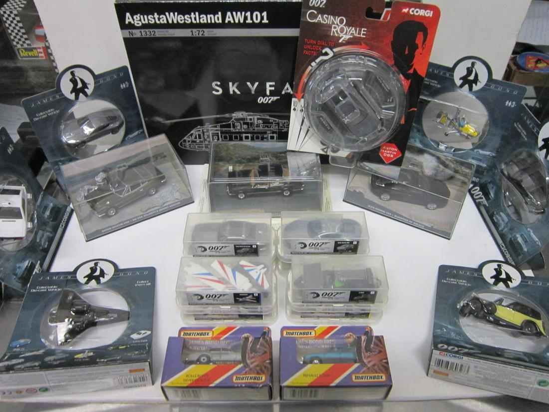 Lot Assorted James Bond 007 Vehicles & Model: Lot Assorted James Bond 007 vehicles & model, all new and like new in original boxes and packages, small scale including; 6 out of 10 Corgi - Lotus Esprit, Roll Royce III, Little Nellie, Moonraker Shu