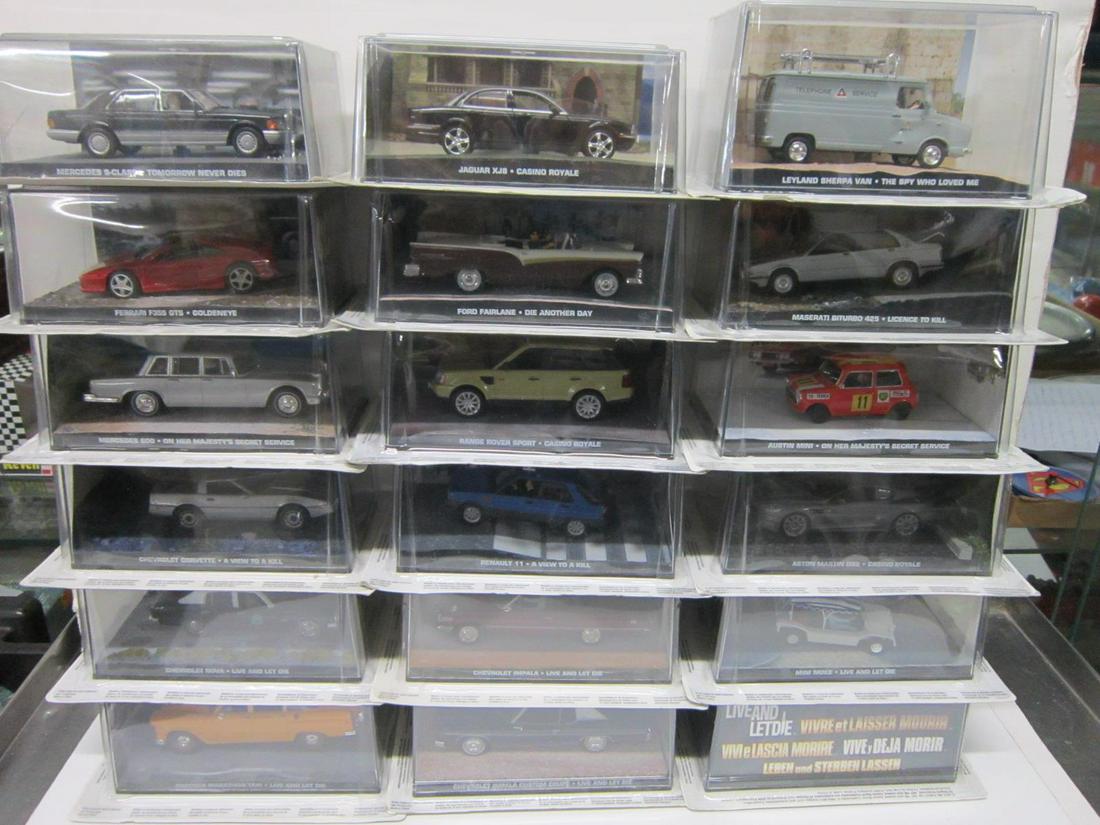 18 James Bond 007 Vehicles w/ Magazines: 18 James Bond 007 vehicles with magazines, all new in original packages including: George Lazenby - On Her Majesty's Secret Service, Aston Martin DBS and Mercedes 600, Roger Moore - Live and Let Die, 