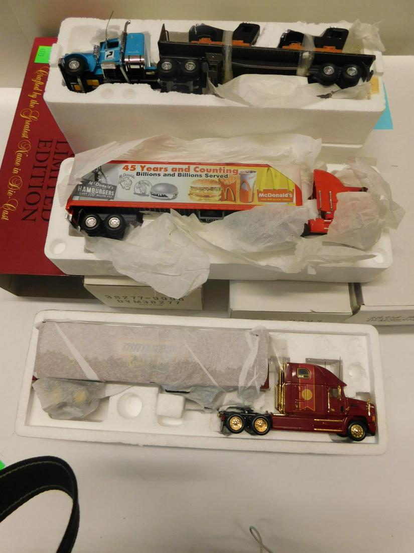 4 Matchbox Collectibles Tractor Trailers: Four Matchbox Collectibles Tractor Trailers, all like new in original boxes, all scale model die cast including: limited edition (maroon box), Millennium Tractor Trailer (special edition, limit 7500),