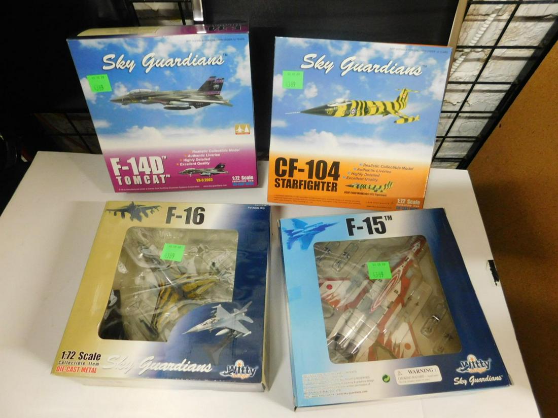 4 Sky Guardians Air Planes: 4 Sky Guardians Air Planes, all new in original boxes, 1:72 scale diecast including: F-15, 52-8850, F-16, CF-104 Star Fighter and F-14D Tomcat. CONDITION: No issues identified.