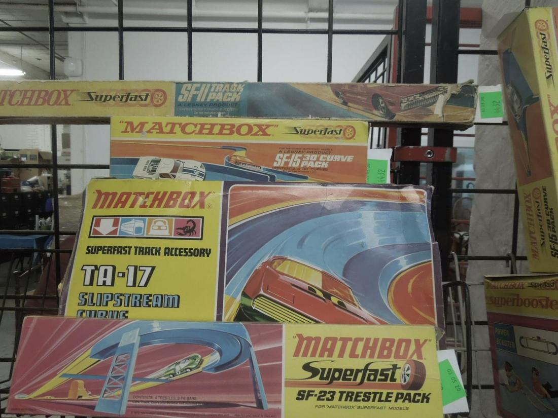 5 1970: 5 1970's Matchbox Superfast Track Accessories, all in original boxes including: SF-15, 30º curve pack, TA-17, Slipstream curve with trestles, SF-17 Slipstream curve pack, SF-23 trestle pack, and SF-1
