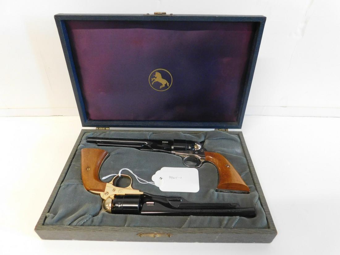 Pair Colt Centennial Revolvers: Pair Colt Centennial Revolvers, Civil War Centennial, 22 cal short; black finish, walnut grips, six shot; serial number 5344W with gold highlights; serial number 5345W with nickel highlights; barrel l