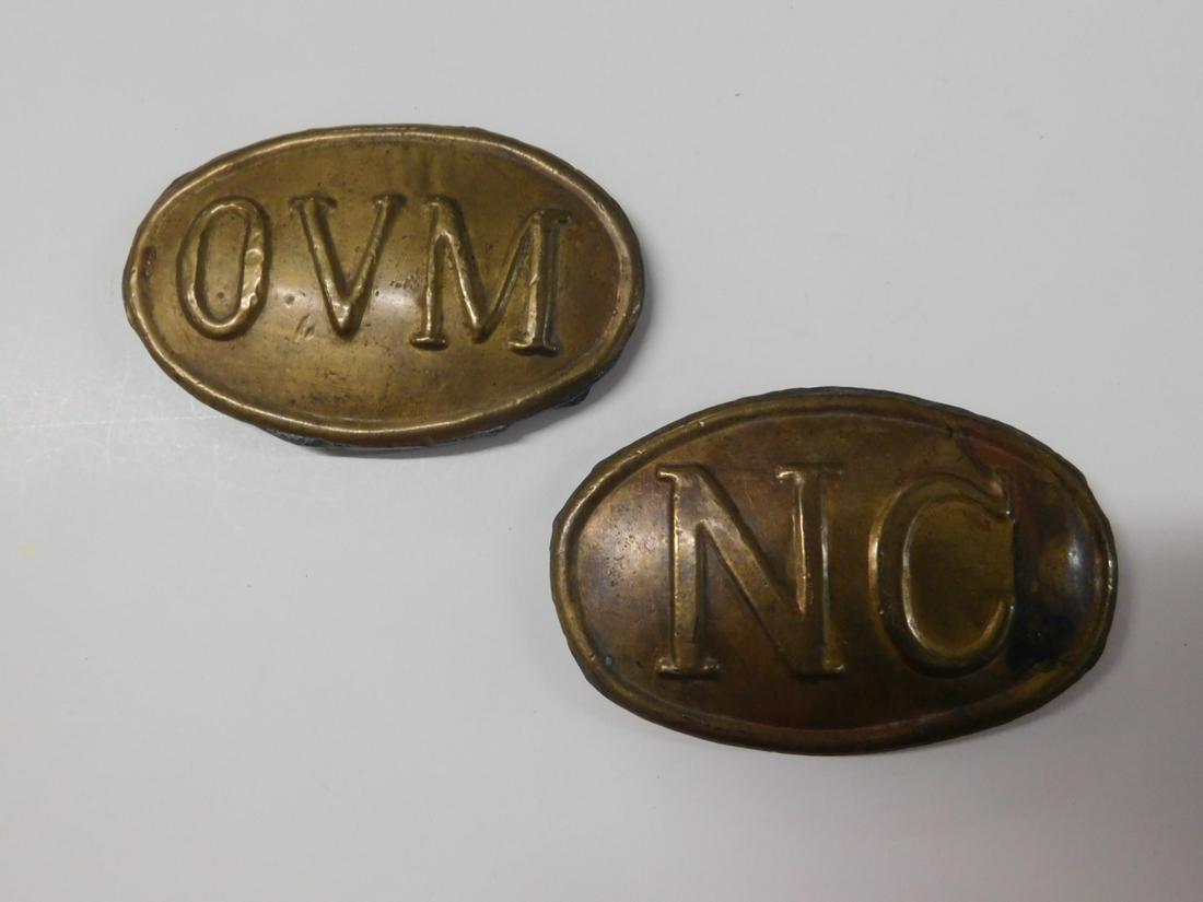 2 Civil War Oval Belt Buckles: 2 Civil War Oval Belt Buckles, both stamped metal over lead with rounded wire hook and belt loop including: Confederate NC (North Carolina) and Union OVM (Ohio Volunteer Militia), both approximately 2