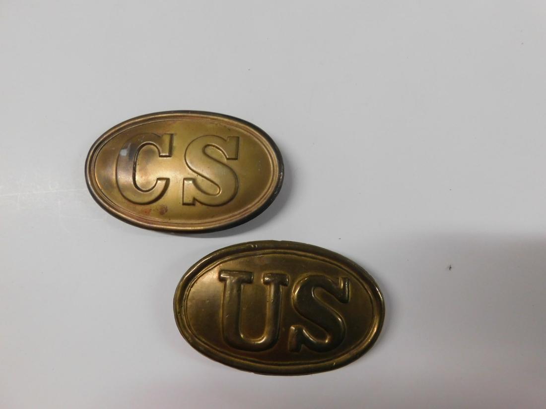 2 Civil War Belt Buckles: 2 Civil War Belt Buckles, embossed brass over lead, both oval, 2 1/8" x 3 3/8" including: US (Union Army) and CS (Confederate States), raised edge rim, US with imbedded wire loop and hook, CS with bra