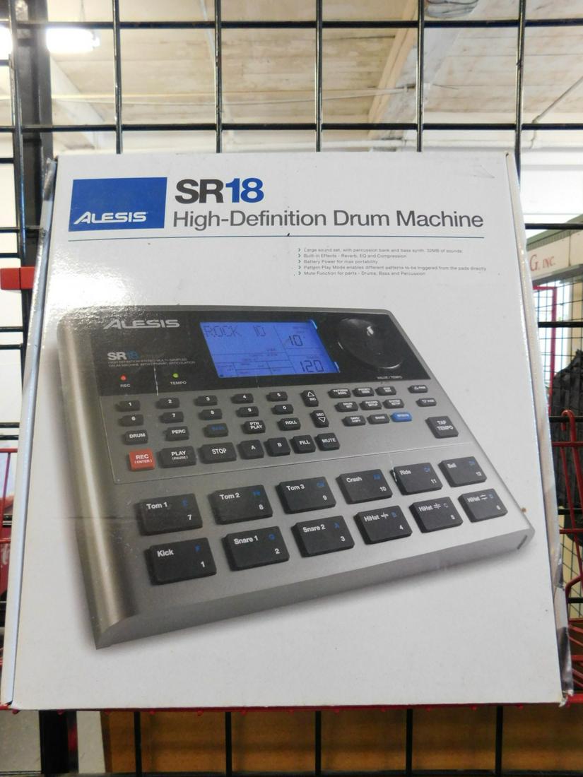 Drum Machine: Drum machine, Alesis SR-18 high definition drum machine, acoustic and electronic samples for all musical styles with box. CONDITION: Used, working.