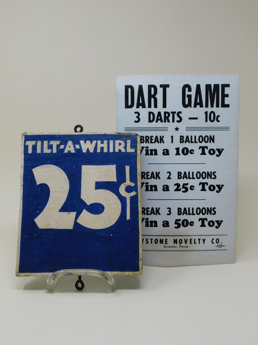 Vintage Carnival Tilt-A-Whirl Sign: (2 pieces) A small painted wooden admission price sign from a carnival or funfair, reading "Tilt-A-Whirl 25Â¢" in blue and white. Along with: a small printed price sign on card stock for the "Dart G