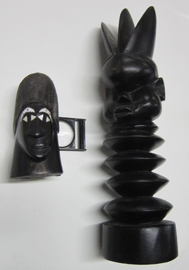 2 African Hardwood Carvings: 2 African Hardwood Carvings including; Matinci (signed) African head with a long spool turned neck 13 3/4" l. ans bust of man with Mother of Pearl inlaid eyebrows, 5" h. 20th c. Condition; very good