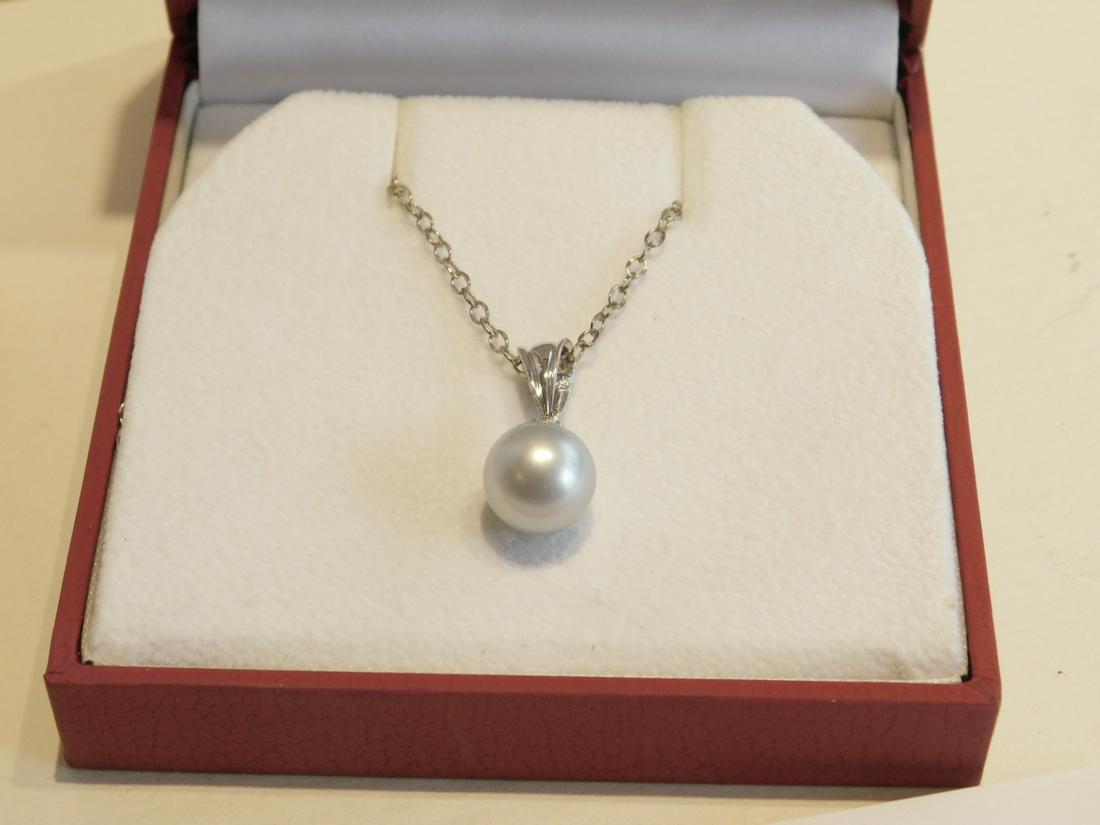 Tahitian Pearl on Sterling Necklace: Tahitian pearl on sterling 15" link chain, 10mm light button Tahiti pear, original box & paperwork. CONDITION: like new.