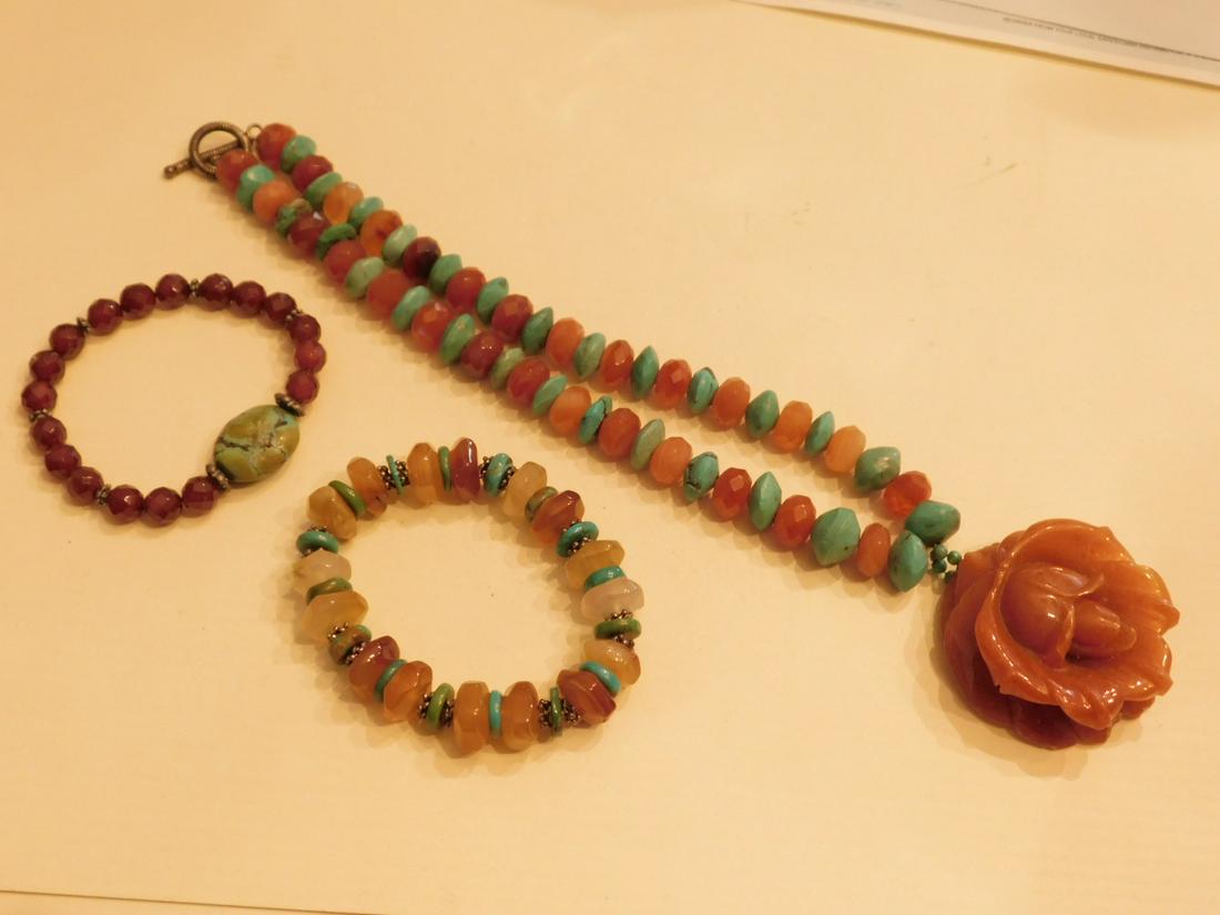 Turquoise & Carnelian ? Necklace w/2 Bracelets: Turquoise and Carnelian? necklace with 2 bracelets, 16" alternating turquoise and faceted carnelian colored beads with a carved carnelian glass 1" diam, flower. 1 bracelet with Heishi turquoise, glass