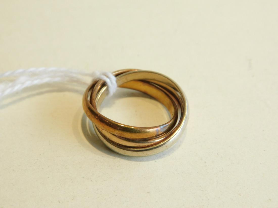 Cartier Tricolor Trinity Ring: Cartier Tri-Color Trinity Ring, 18k. gold, 3 interlocking rolling bands, 3.7 dwt, size 4 1/2, with Cartier bags, approx. retail, $1300.00 [8] Condition; very good, used
