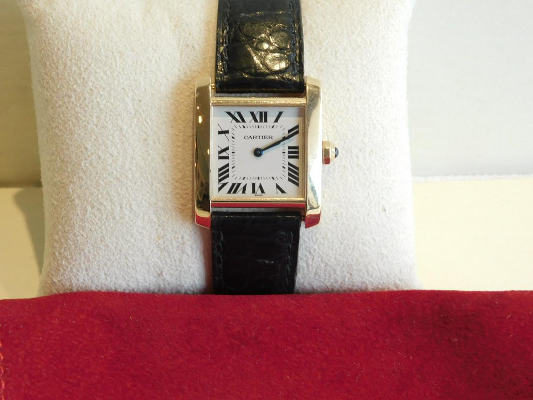 Cartier Tank Francaise 18k Wristwatch: Cartier Tank Francaise, 18k yellow gold wristwatch, mid-size 25 x 30mm, metallic silver dial with Roman Numerals, cc801876, 1821, water resistant, Quartz movement, black leather band with folding 18k 