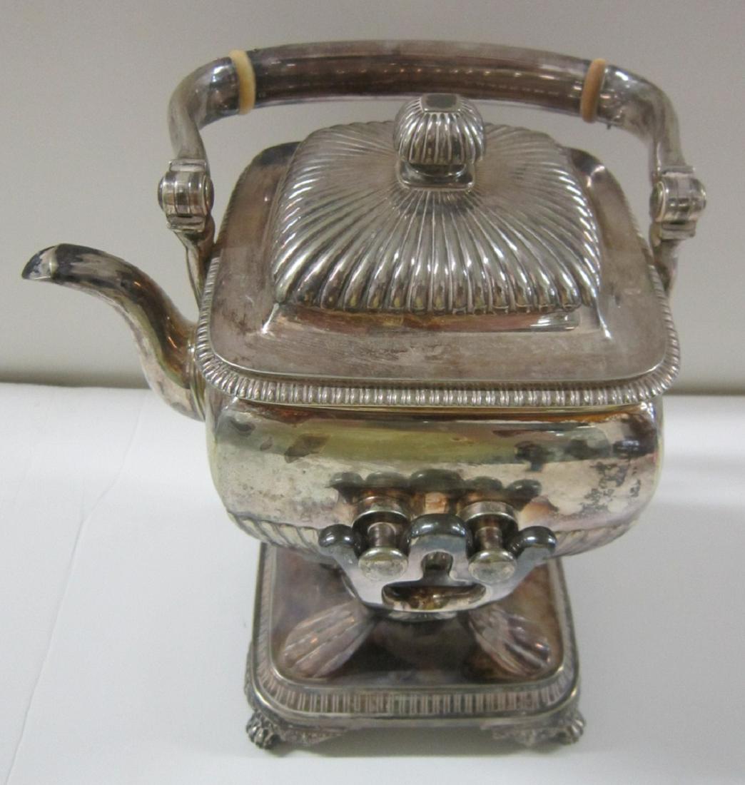 Tiffany & Co Silverplate Tea Kettle on Stand: Tiffany & Co Silverplate Tea Kettle on Stand, silver soldered electroplate, ribbed and gadrooned Georgian Revival design, swing handle with insulators, base with burner and four winged claw feet, two 