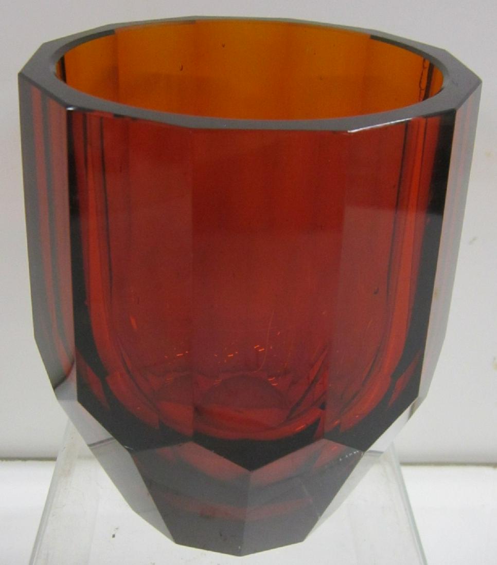 Josef Hoffmann for Moser Vase: Josef Hoffmann for Moser Vase: A handblown and panel cut vase in honey amber glass, manufactured by Moser in Czechoslovakia. It was designed by Josef Hoffmann of the Wiener Werkstatte. Early 20th cent