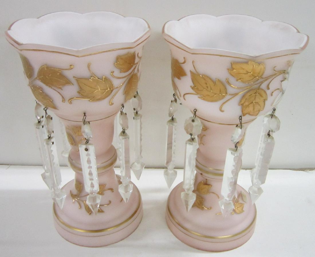 Pair Cased Glass Mantle Lustres: Pair Cased Glass Mantle Lustres. Made in the US Zone, Germany; hollow form, pink over opaque white glass with raised gilt floral decoration; cut crystal spear drops. ca 1950. CONDITION: Fine, no wear 