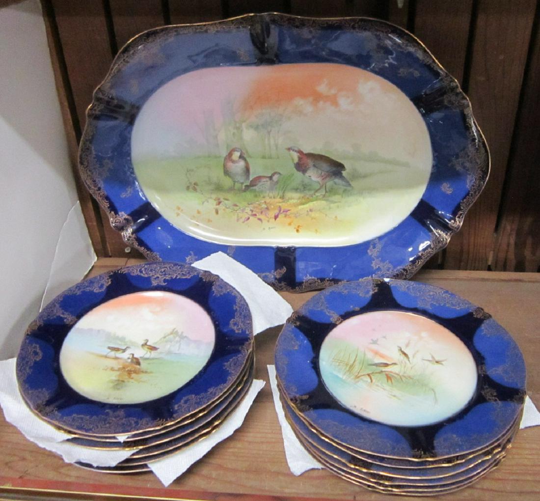 13 Piece Theodore Haviland Limoges Game Set: 13 Piece Theodore Haviland Limoges Game Set: Theodore Haviland Limoges Game Set: a thirteen piece Limoges porcelain set consisting of a large oblong platter and twelve plates. Manufactured by Theodore