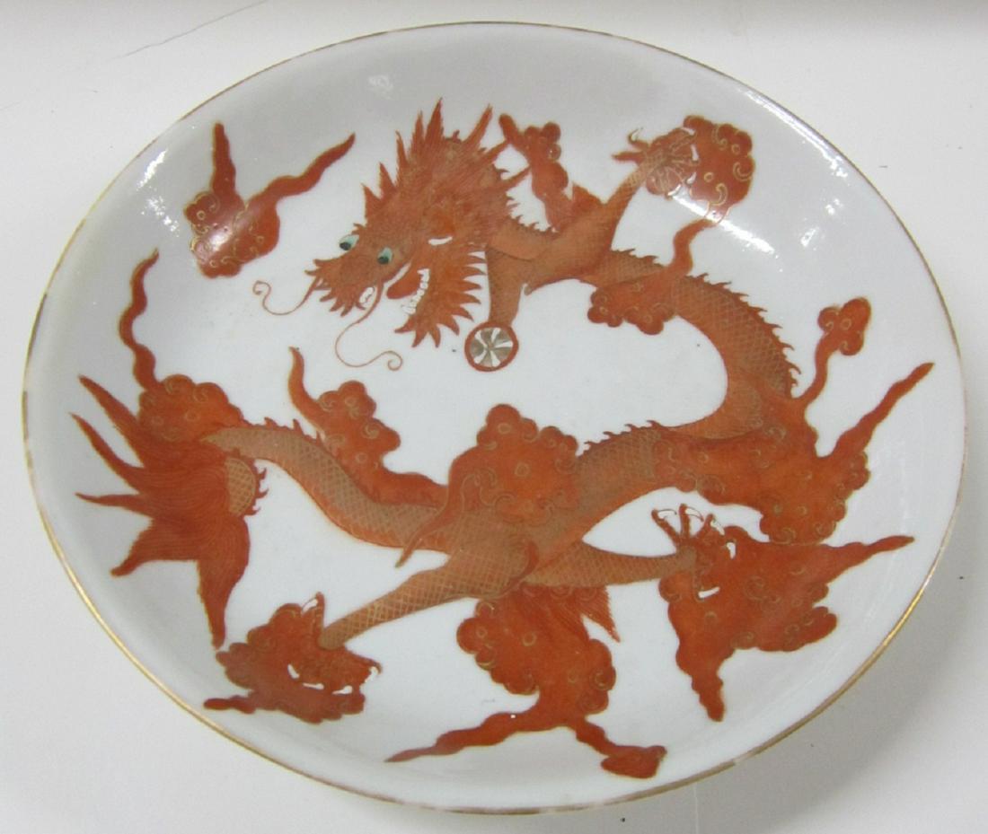 Chinese Porcelain Dragon Bowl: Chinese Porcelain Dragon Bowl white porcelain, white glaze porcelain with hand painted iron red dragon, red chop, marks on base, 7 5 /16" diam. x 1 7/16" h. CONDITION: gold loss along top rim, small m