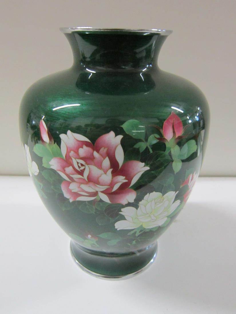Ando Shippo Japanese Cloisonne Vase: Ando Shippo Japanese Cloisonne Vase, green foil-backed ground with red and white peonies, silver rims. Maltese cross mark on bottom rim. Mid 20th c. 10" h. CONDITION: Light wear to bottom silver rim, 
