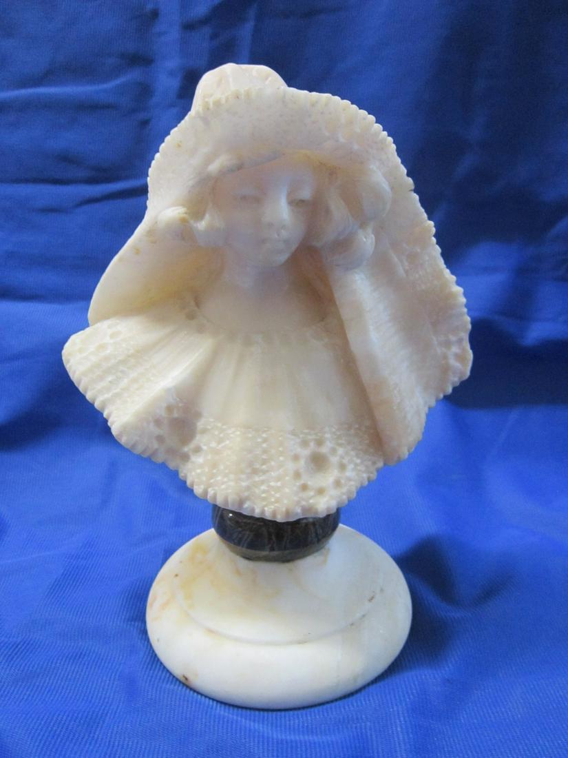 Small 19th c. Alabaster Bust of a Woman: Small 19th c. Alabaster Bust of a Woman: A small-scale alabaster bust of a woman in a lace headdress / veil and lace collared dress, the lacework all indicated through drill-work. Probably French, lat