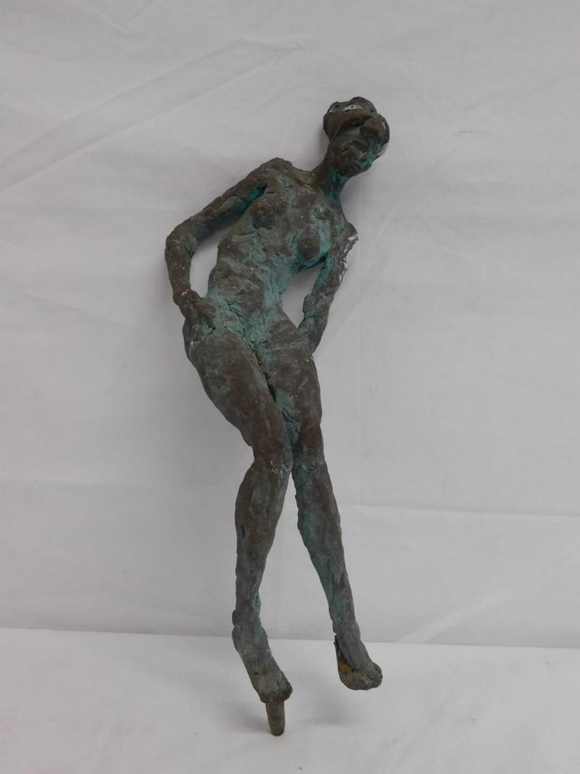 Bronze Reclining Female Nude: Bronze Reclining Female Nude, in the Modern style, green and brown patina, pin in foot for mounting on a base. Mid-20th c. 13" l. (overall).