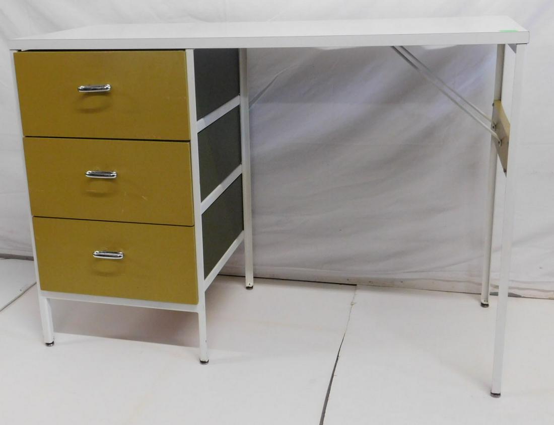 George Nelson for Herman Miller Steel Frame Desk: George Nelson for Herman Miller Steel Frame Desk: steel frame, wooden drawers, white laminate top, Drawers painted avocado green. Metal label in drawer. 1950s. Size: 42" X 17" X 29.5". CONDITION: Wear