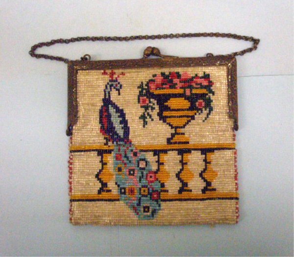 Vintage Beaded Purse: Vintage beaded purse, double sided peacock & floral urn motif, embossed brass frame, chamois lining good condition. 5 1/2" x 6".