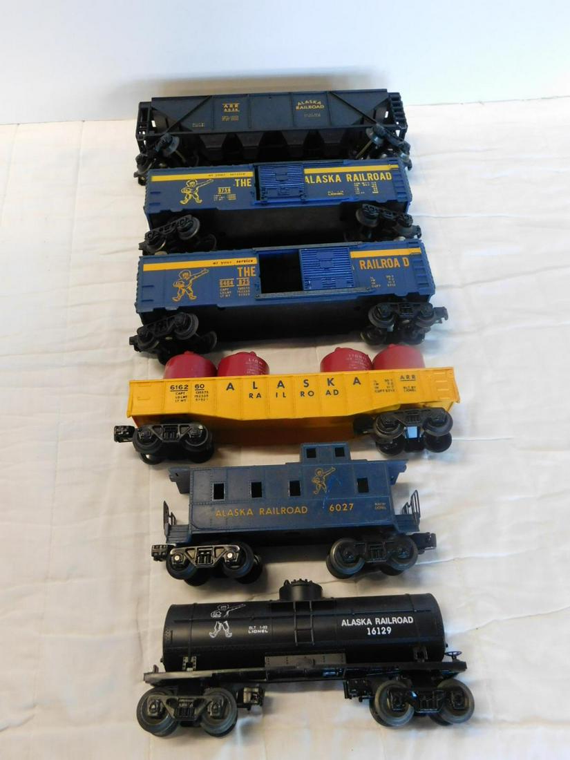 Lionel Alaska Railroad Train Cars: Lionel Alaska Railroad Train Cars, loose, no boxes, "O" gauge including: Post War - hopper car, 6636, Gondola car, 616260 with four red Air Activated containers and caboose, 6027, plus modern era, two