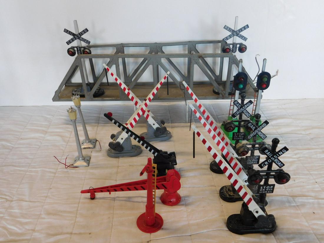Lionel &Other Track Accessories: Lionel &Other Track Accessories including: two Lionel crossing gates, 252, one Lionel crossing gates with signal, two MTLI crossing gates with signal, two Lionel railroad crossing signals, 154, two tr