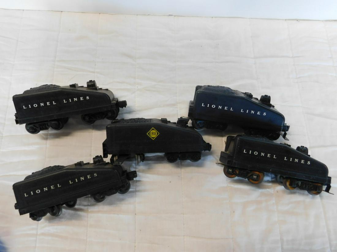 5 Lionel Post War Tenders: Five Lionel Post War Tenders, all slant back, "O" gauge, loose, no boxes including: four Lionel Lines, 1020 and Erie slant back tender. CONDITION: Used, good, minor wear from age and use.