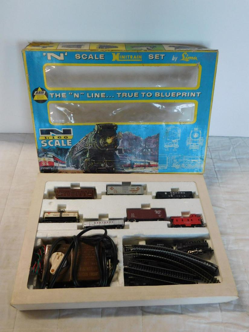 Vintage N Gauge Train Set: Vintage N Gauge Train Set, in original box including: A.T. & S.F. 3283 locomotive and tender, cattle, box, hopper, tanker and gondola cars with Reading 97640 caboose, curved and straight track, left h