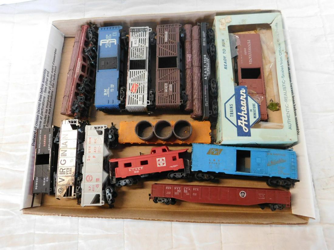 Lot Vintage HO Train Cars: Lot Vintage HO Train Cars, loose, twenty boxes including: Athern, Tyco, Hutco and others, log cars, hopper, cattle cars, gondola, flat car, caboose. CONDITION: Used, good, some may need cleaning, some
