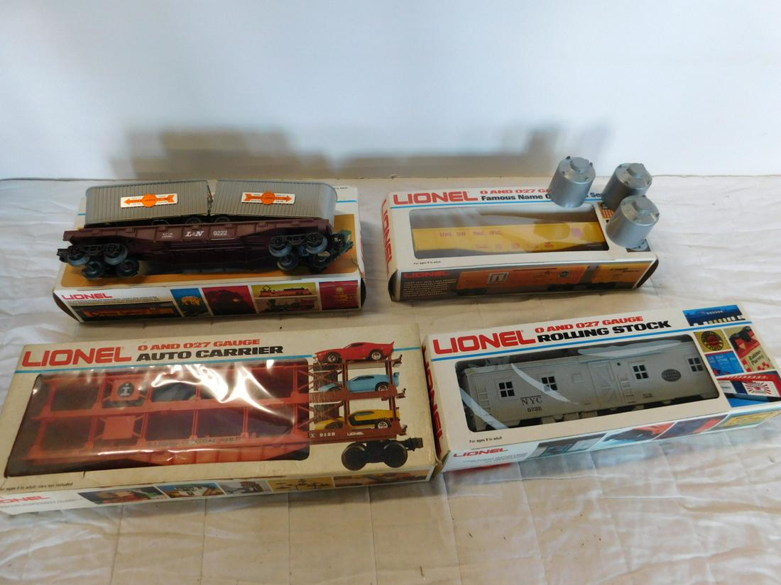 4 Assorted Lionel Train Cars w/Boxes: Four Assorted Lionel Train Cars w/Boxes,"O" and 027 gauge including: L & N flat car with vans 6-9222, New York Central bunk car 6-5735, Union Pacific Gondola 6-9283 (with three mismatched containers) 