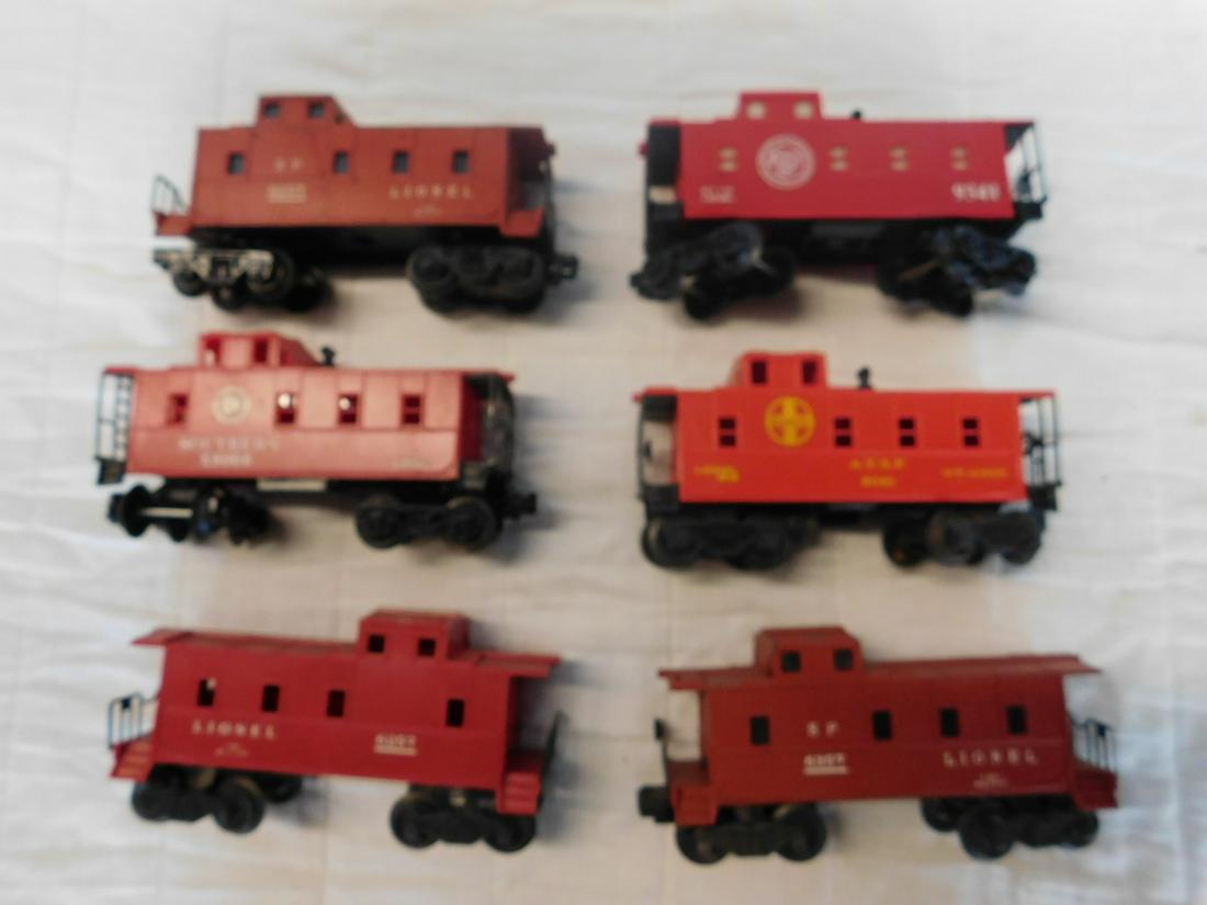 6 Lionel SP Type Train Cabooses: Six Lionel SP Type Train Cabooses, "O" gauge, loose, no boxes including: Post war - 6257, SP 6257and SP 6357, plus Modern Era - Santa Fe 9061, Southern Railroad X9066 and Atlantic Coast Line 9341, all
