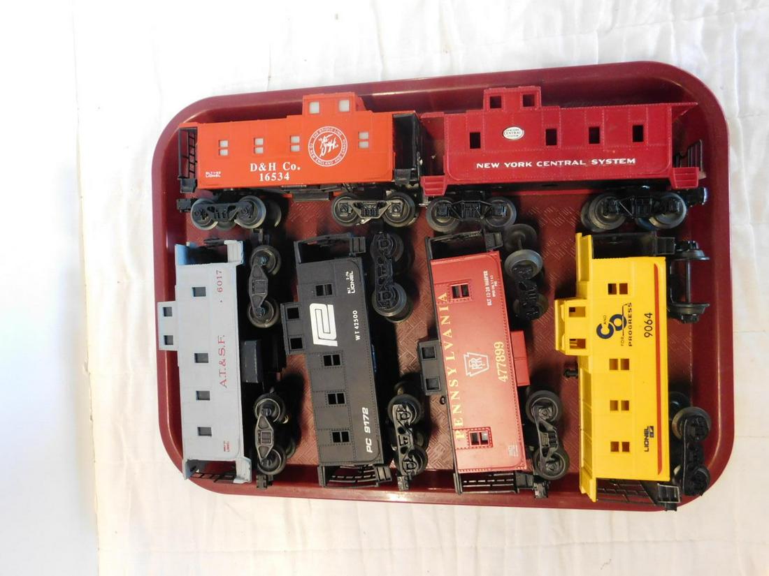 6 Lionel & Other Train Cabooses: 6 Lionel & Other Train Cabooses, "O" gauge, loose, no boxes including: Lionel Post war ATSF 6017, gray and Modern Era - Penn Central 9172, black, Pennsylvania, 477899, red, Chesapeake & Ohio 9064, yel