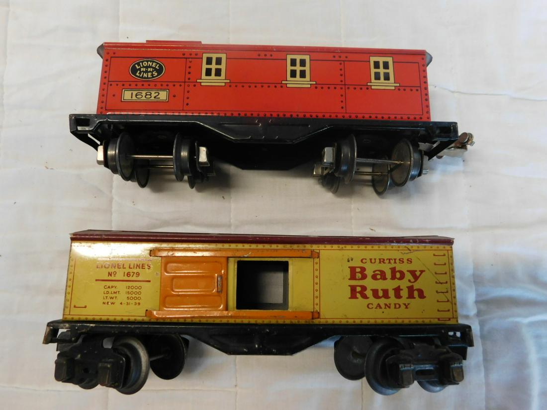 2 Lionel Pre War Train Cars: Two Lionel Pre War Train Cars, loose, no boxes, including: Lionel Lines Curtiss Baby Ruth candy box car, No. 1679 and caboose, No. 1682, both tin litho. CONDITION: Used, some scratches from age and us