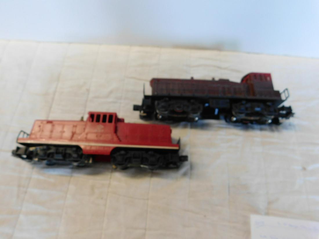 (2) "O" Gauge Train Switchers: Two "O" Gauge Train Switchers, both loose, no boxes including: Lehigh Valley 627 red diesel switcher 4-0-4, 11" and K-Line GI Joe, K-2200 - 8 diesel switches 4-0-4 (with decals), 11 1/2". CONDITION: M