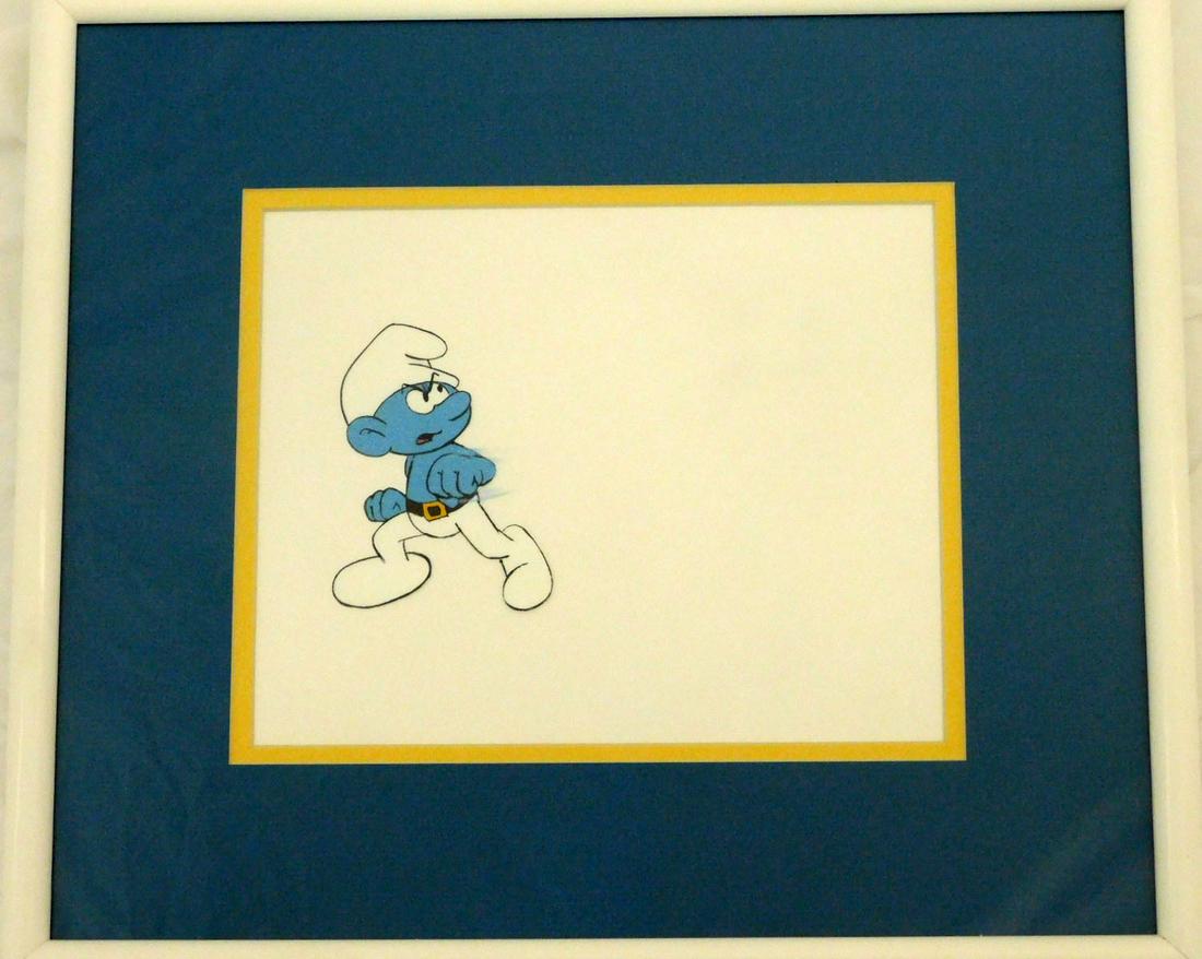 Original Production Cel "Smurf": Original Production Cel "Smurf", Hanna Barbera Productions - The Smurfs television series,c. 1980s featuring Tuffy Smurf, (in motion- swinging fist), no background, matted 8" x 9 7/8'" (site) frame, 1