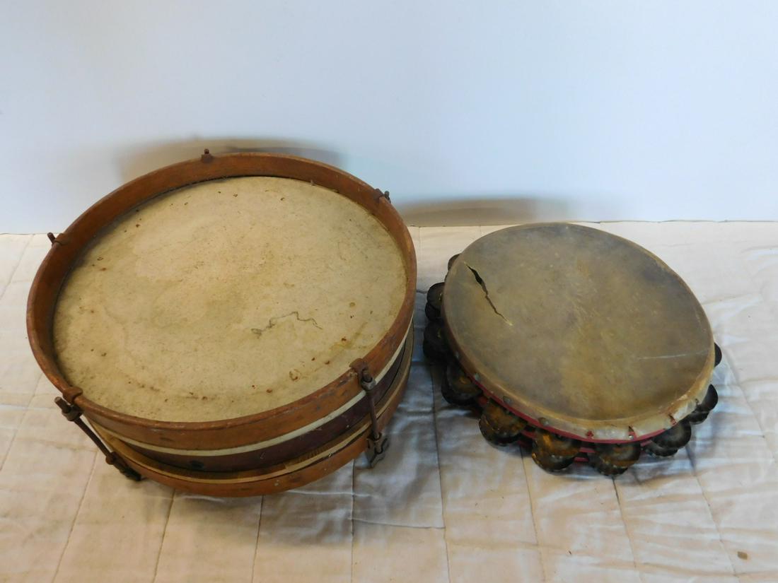2 Vintage Musical Instruments: Two Vintage Musical Instruments including: tambourine with double row of jingles 11"d, x 2 3/8" h and drum, wood banded in center and edge pieces,Slingerland Select, five tension rod snare head top an