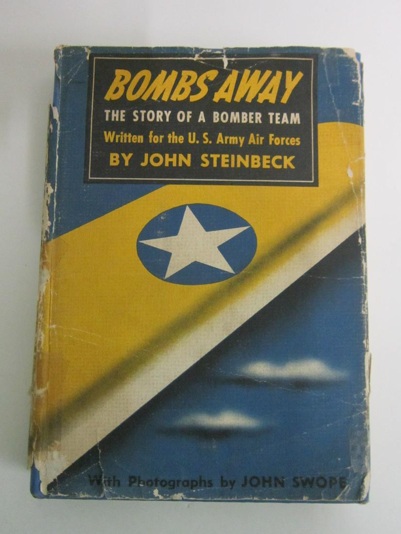 Steinbeck John Bombs Away 1st Printing: Steinbeck, John, Bombs Away: The Story of a Bomber Team, Viking Press, New York, 1942. First printing. Albert J Raman collection. Condition; DJ lacking lower part of back panel, worn, chipped, tape-re