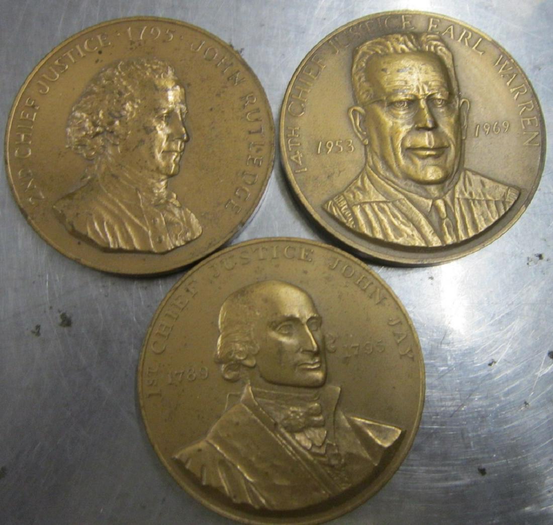 Three Bronze Chief Justice Medallions: Three bronze medallions of United States Supreme Court Chief Justices, struck by the US Mint at some point in the mid-20th century. Consisting of: John Jay, John Rutledge and Earl Warren. Size: 3" in