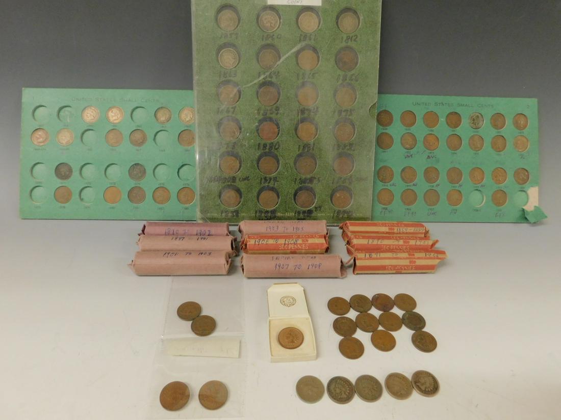 537 Indian Head Pennies: 537 Indian Head Pennies, (a) twenty-four under plexiglass cover 1859 to 1867, 1869, 1874, 1875, 1878, 1880 to 1890, - 1883, 86, 88 are AU or Uncirculated. (b) forty-two in green two page binder, all A