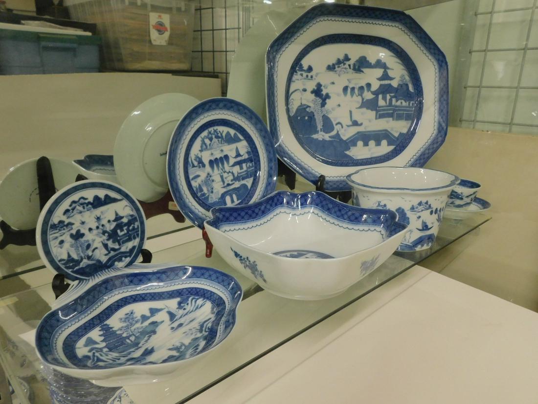 7 Pcs Mottahedeh Blue Canton Porcelain Dishes: Seven Pcs Mottahedeh Blue Canton Porcelain Dishes includes: 14" x 17" platter; four sided deep bowl 9 1/2"d, 4 1/2"h, ovoid shaped planter, 8 1/2"l, 4 1/2"h, shaped dish with handle, 8 1/4", 1 3/4"h;