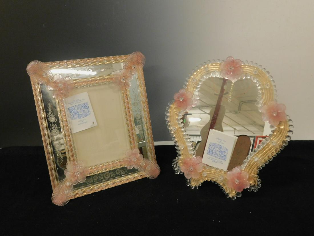 2 Murano Glass Picture Frames: Two Murano Glass Picture Frames, by Giampaolo Nason in Venetian style, in clear and peach colored glass with pale pink applied glass flowers, shield shape with mirror, 12" x 11", rectangular shaped fo