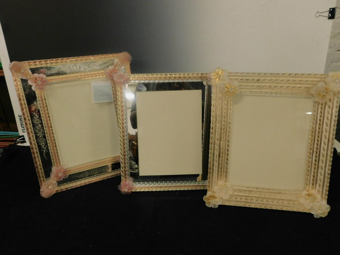3 Murano Glass Picture Frames: Three Murano Glass Picture Frames by Nason studio, Italy each with clear and colored glass rope turned frame segments and applied floral rosette corner mounts, 20th C. all free standing, frame sizes, 