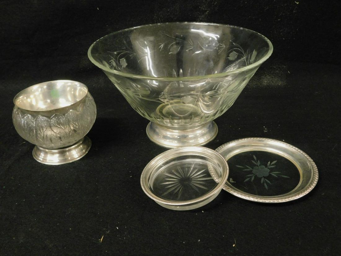 Sterling Silver & Glass Tableware: Sterling Silver and Glass Tableware includes: 4"d, 2"h, Revere bowl; leaf form molded glass, 4 1/2"d bowl on sterling base; an etched glass 10 1/4"d punch bowl on sterling base; and two glass and ster