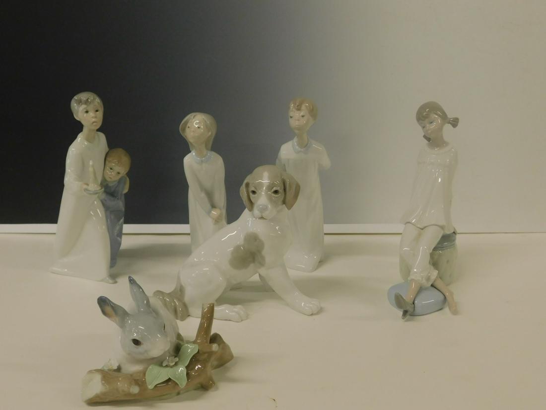 6 Lladro Figures: Six Lladro Figures, Lladro includes: 8" boy and 7 1/2"girl (kissing), 7 1`/2" girl on ottoman, 4 1/2" Long Rabbit; Nao includes: 8 1/4" two boys with candle and 6" h seated dog. CONDITION: Very fine,