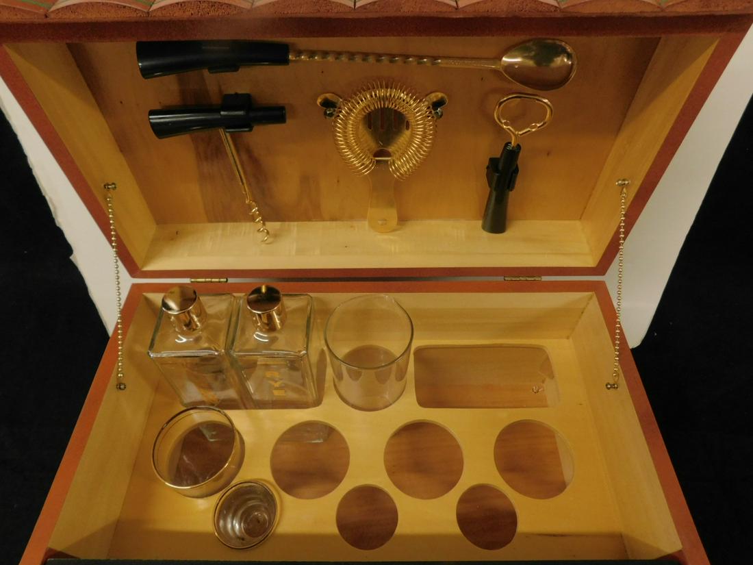Book Bar by Karoff: Book Bar by Karoff, model 4550, features faux books with hinged top and front, opening to decanters, goblets, etc, circa 1950, book size 16 1/" x 9 1/2" x 9 1/2", shipping box size, 19" x 12" x 15". C