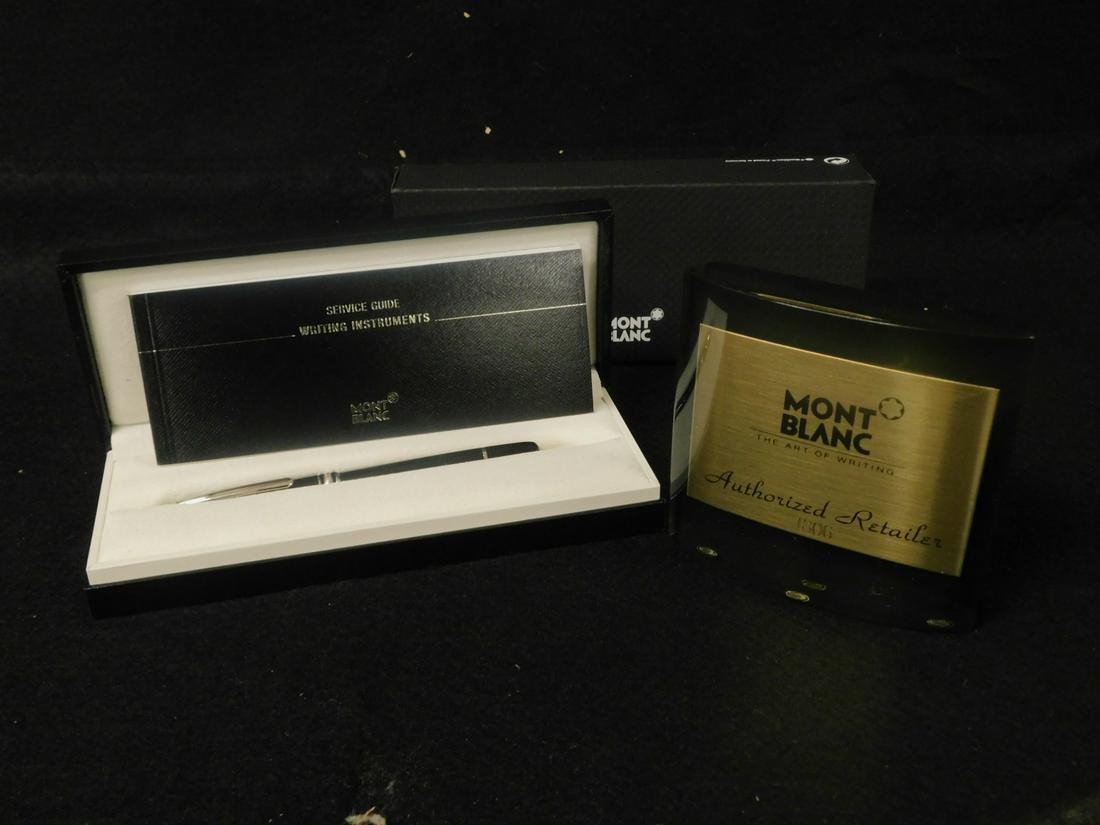 Mont Blanc Roller Ball Pen: Mont Blanc Roller Ball Pen, Meisterstuck Classic P 163 model, black and silver, serial number EX1059844, old stock new in original boxes with service guide. CONDITION: New in box.