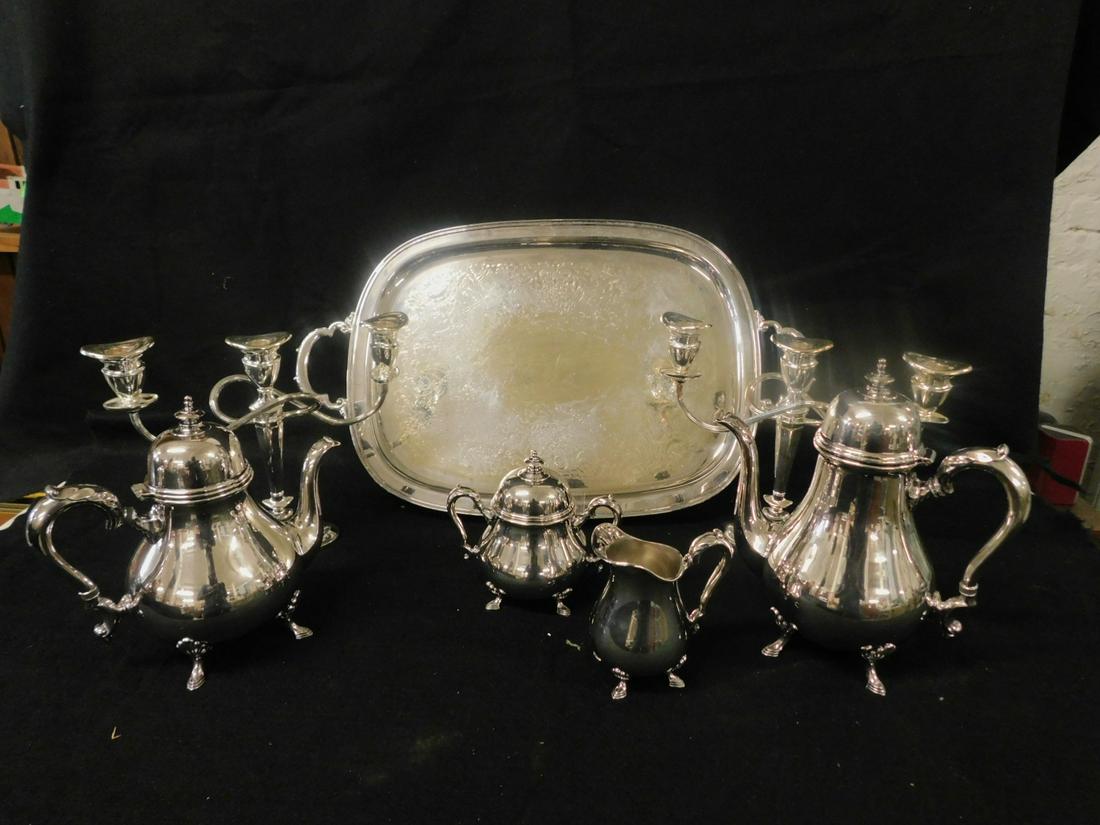 7 Pc International Silver Plate Coffee Set: Seven Piece International Silver Plate Coffee Set,Georgian Court pattern, includes: coffee pot, tea pot, covered sugar, creamer, tray and pair of unmarked Federal style three light candelabra. CONDITI