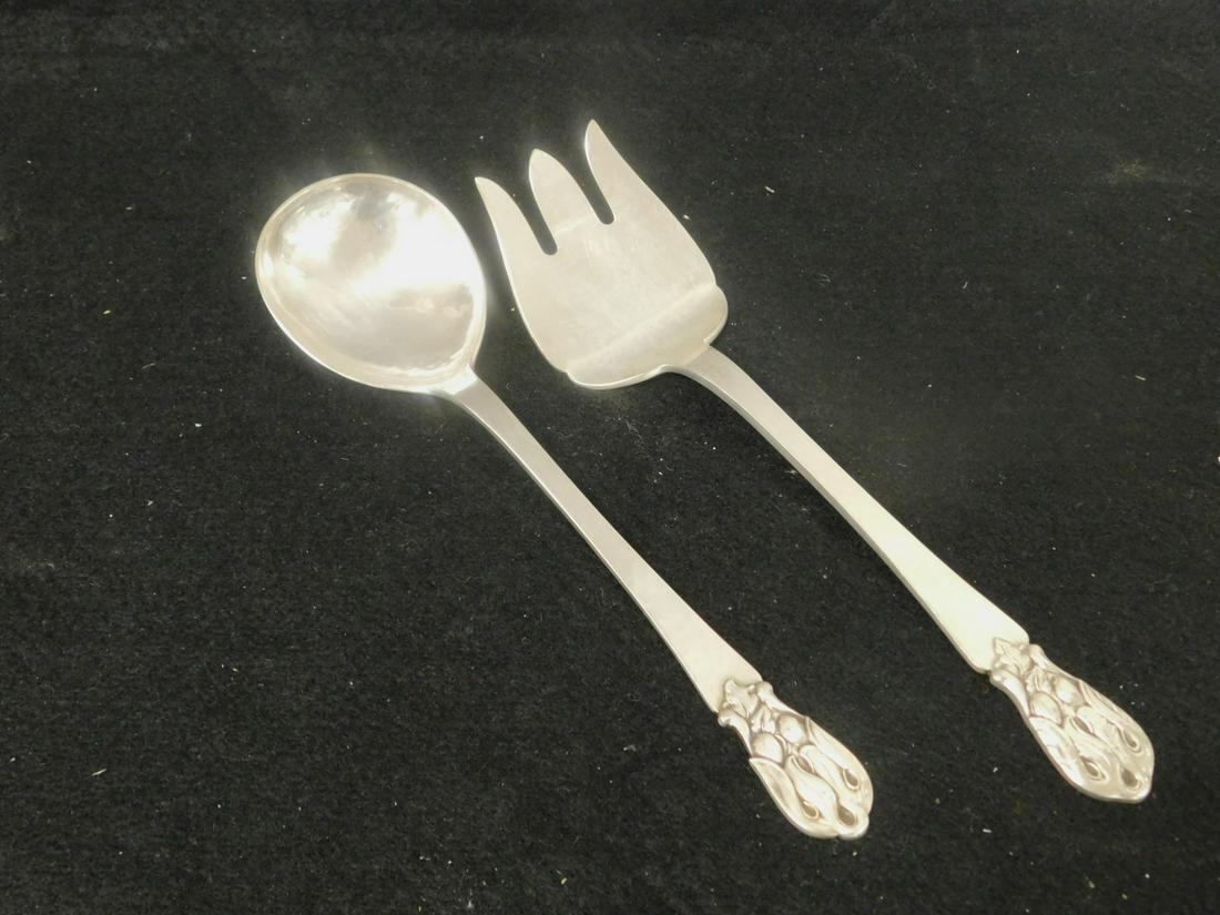 Hand Made Sterling Salad Fork & Spoon: Hand Made Sterling Salad Fork and Spoon, maker's touch mark, hammered sterling with fruit and leaf crested handles, 10 1/2" l, 8.44 ozts TW. CONDITION: Very good used condition, some minor scratches.